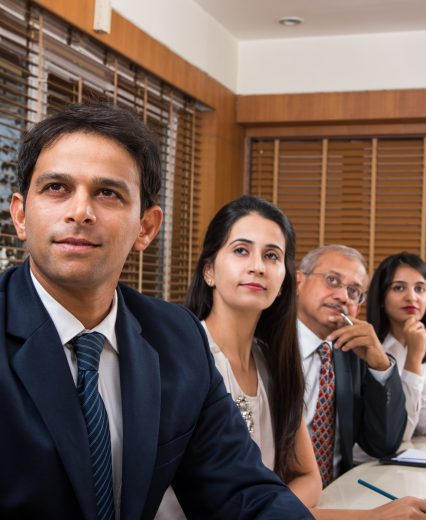 Asian Indian Business People or Corporate culture and Working in the office Concept with Laptop, papers, meetings, presentations and discussions